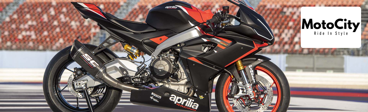 A sleek Aprilia motorcycle displayed at Motocity Daytona, showcasing its modern design and powerful features.
