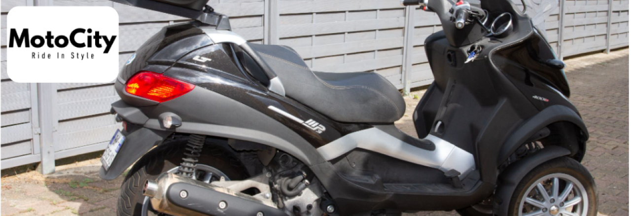 A sleek Piaggio scooter in Naples, FL, ready to ride in style.

