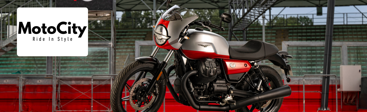 A sleek Moto Guzzi motorcycle on display at MotoCity Motoplex Daytona, ready for adventure.
